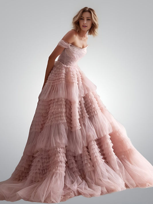 Full view of POLLY formal dress with dusty pink color and crumpled tulle ruffles