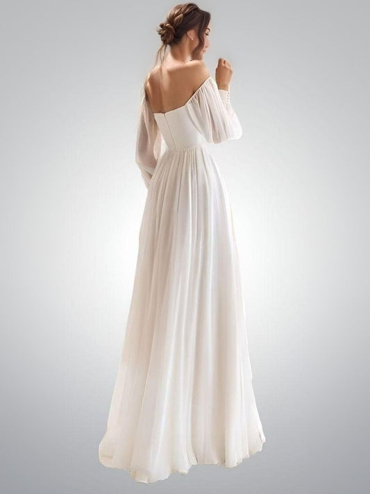 Close-up of backless design of Raina wedding dress showcasing elegant pleating