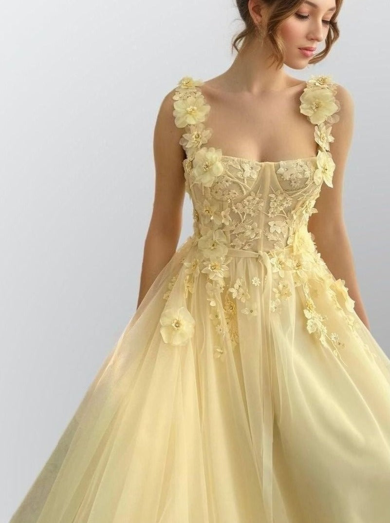 RAYA light yellow couture dress with floral appliques and delicate sashes.