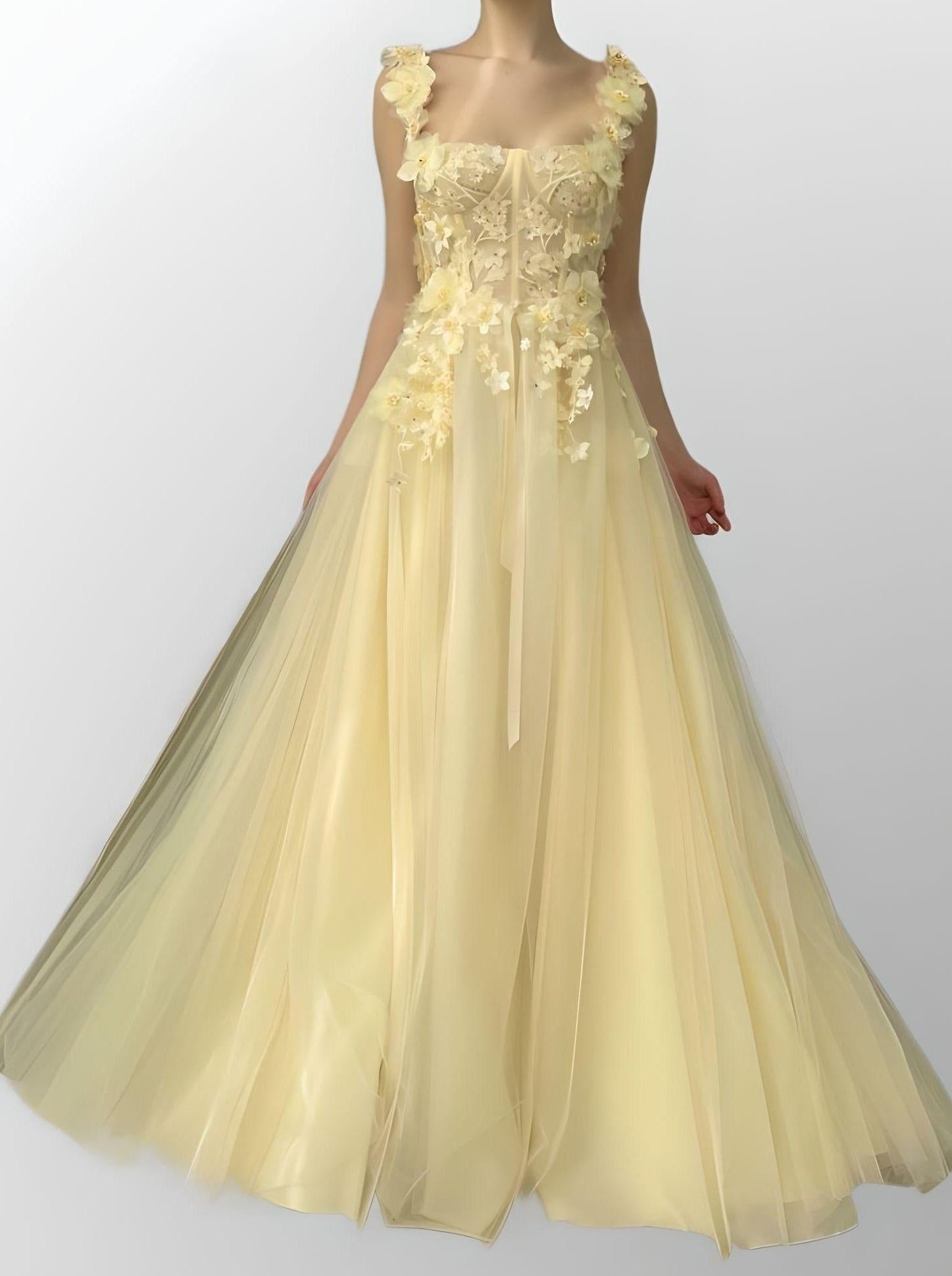 Elegant RAYA light yellow A-line prom dress with spaghetti straps and floral decoration.