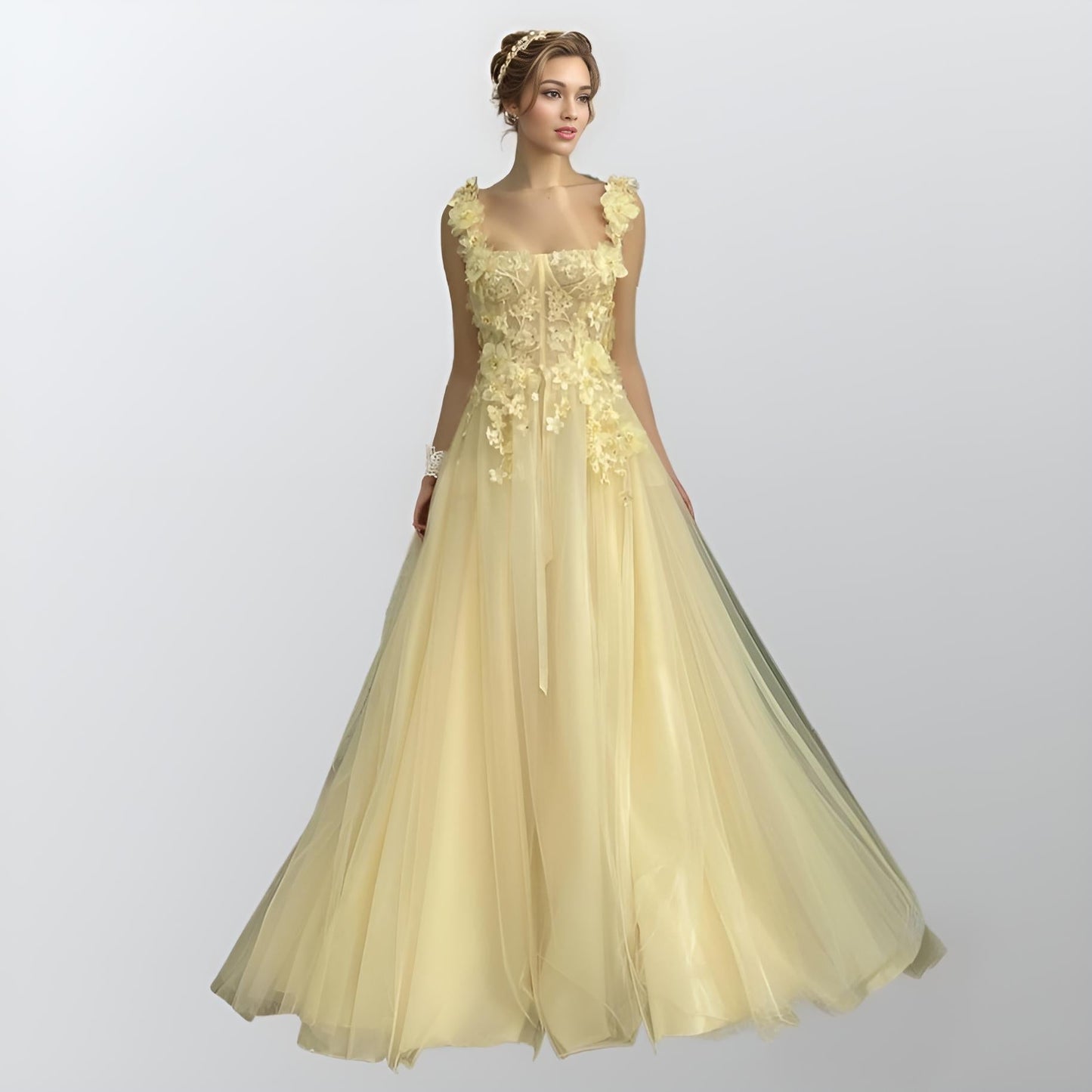 Model wearing RAYA light yellow tulle formal dress with spaghetti straps and floral appliques.