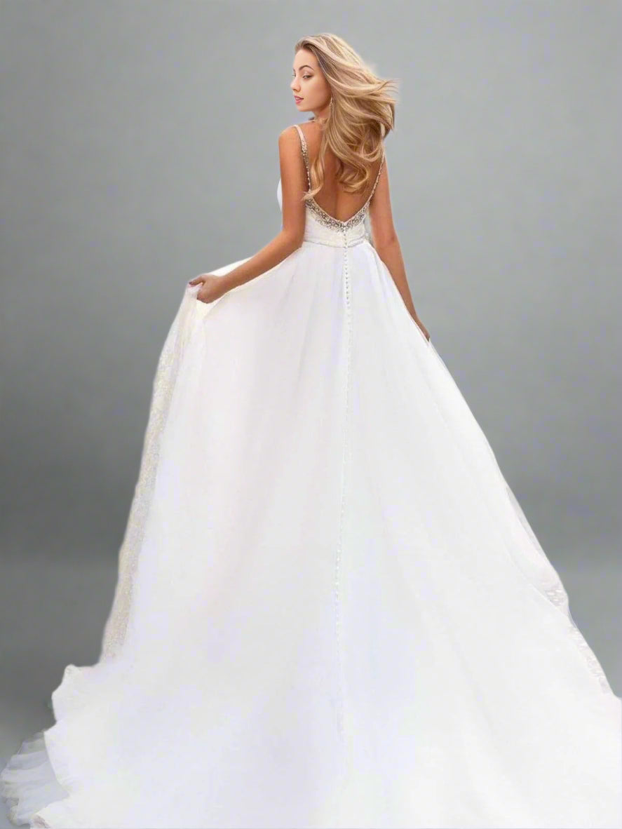 Beautiful women with flowing hair showcasing Backless RORY Wedding Gown