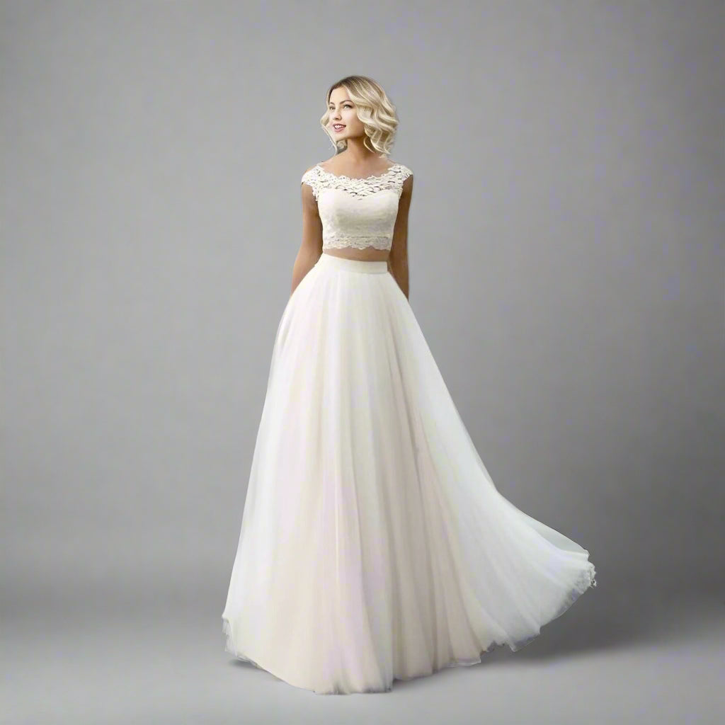 Bride wearing Rosa Two Piece Wedding Dress with full tulle skirt and lace top.