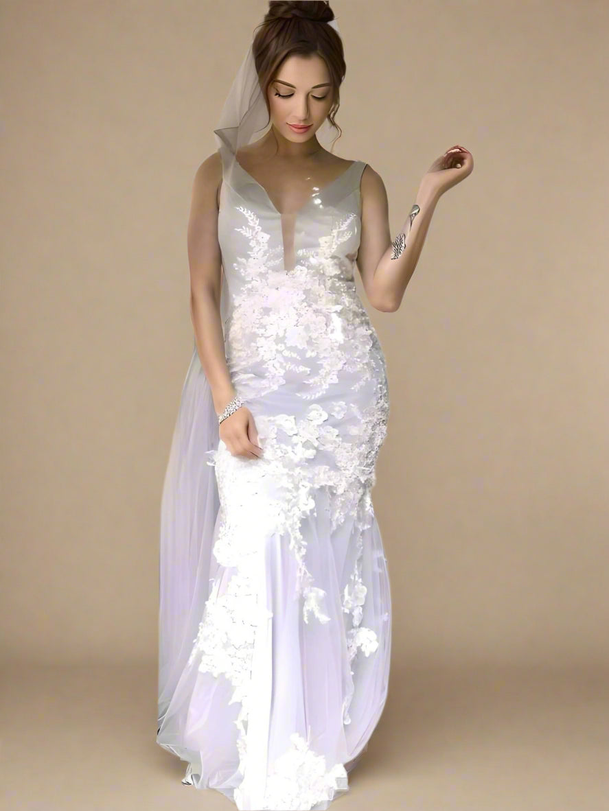 Bride showing off the stunning mermaid silhouette of the SANDRA wedding dress.