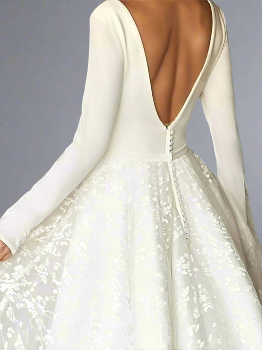 Close-up of back and leaf lace details on the tulle skirt of the SARAH wedding dress.