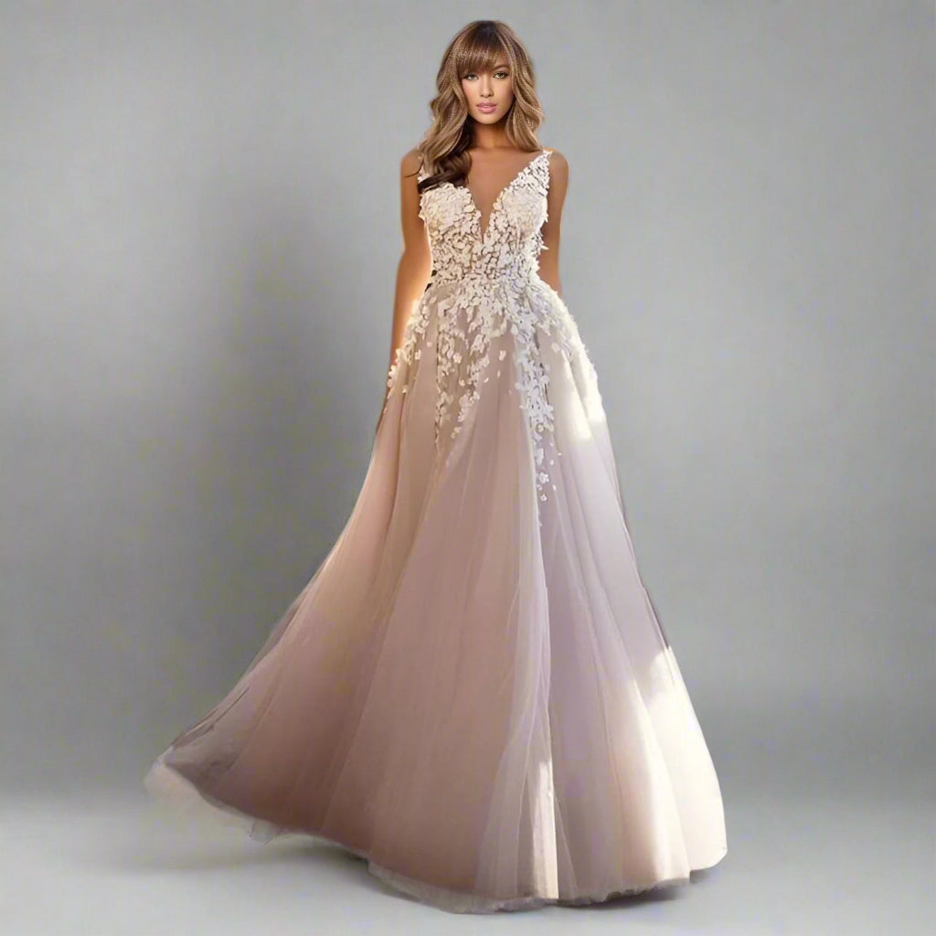 Bride wearing the Sharon Wedding Dress, showcasing the deep V-neckline and lace appliques.