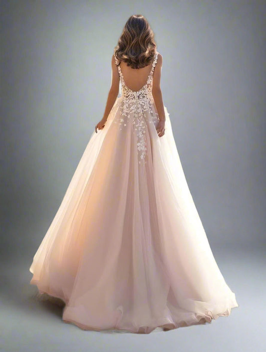 Back view of the Sharon Wedding Dress, featuring its elegant backless design.