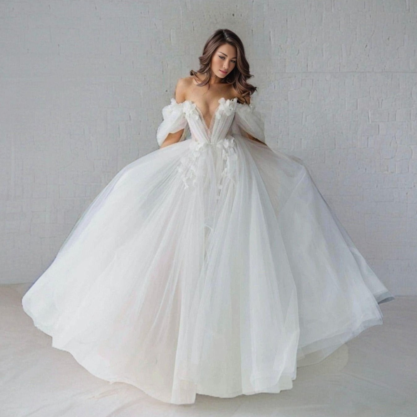 Bride twirling in the SHERYL gown, highlighting its layered tulle skirt.