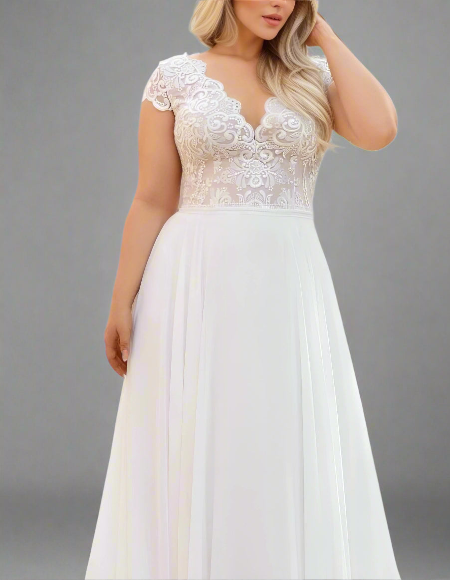Close-up of the lace detailing on the bodice of the SKYE Wedding Dress.