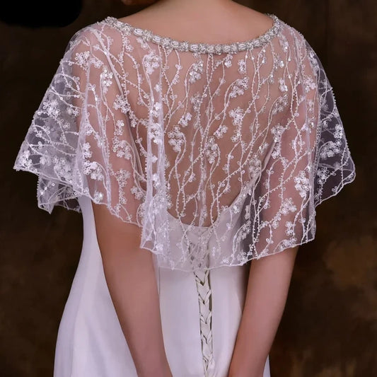 Back view of the bride wearing the Sparkling Beaded Bolero, showing the intricate sequin design.