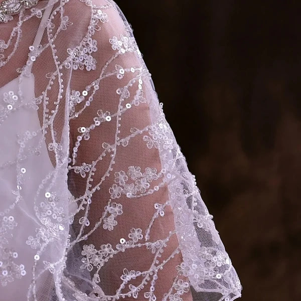 Detailed shot of the pearls and sequins on the Sparkling Beaded Wedding Wrap.