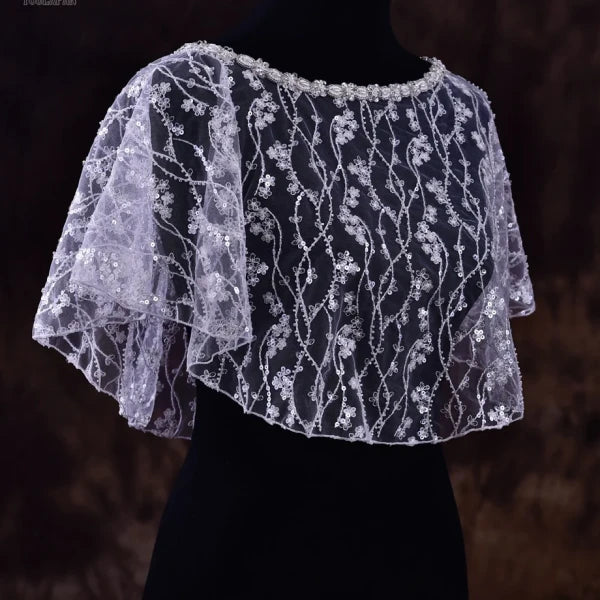 Close-up of the delicate craftsmanship and handmade details of the Sparkling Wedding Bolero.