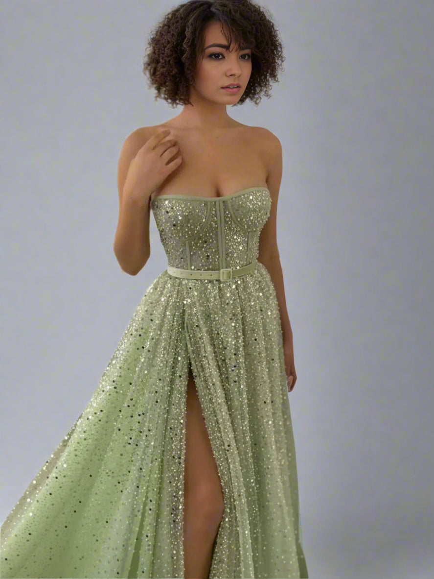 Woman in Stella Evening Gown, displaying the sparklin and elegant design.