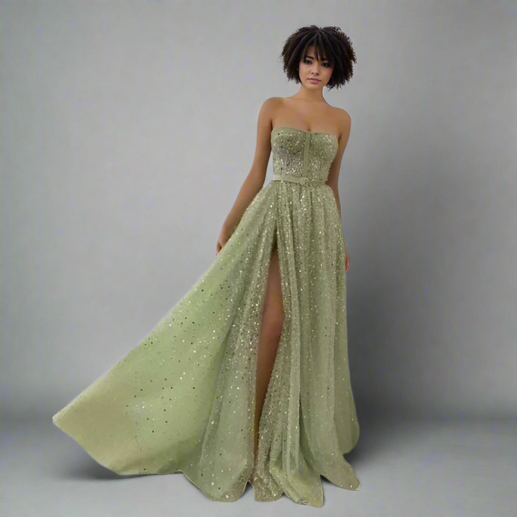 Model wearing the Stella mint green Glitter Sequin Formal Dress, showcasing its sparkling details.