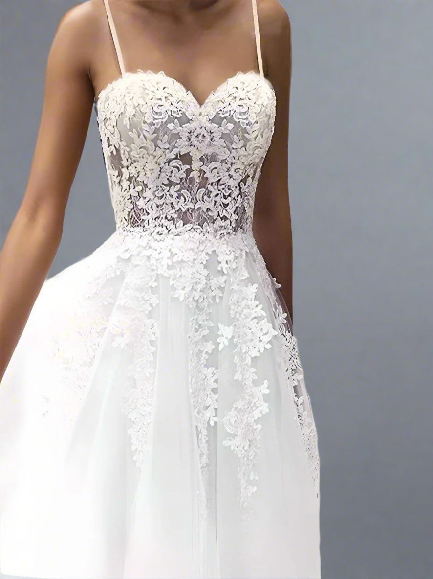 Bride twirling in the Stephanie Wedding Dress, demonstrating the elegance of the A-line silhouette.
