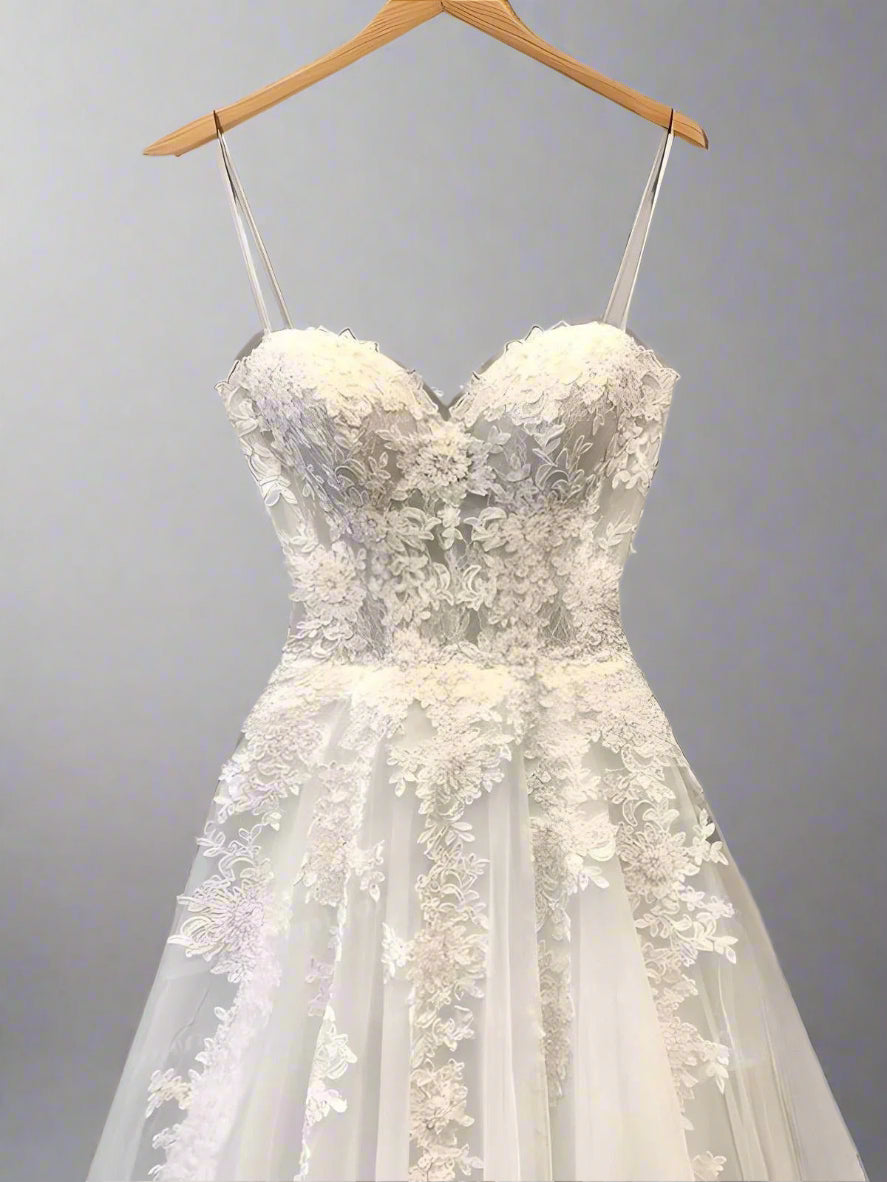 Close-up of the spaghetti straps and sweetheart neckline for delicate detailing.