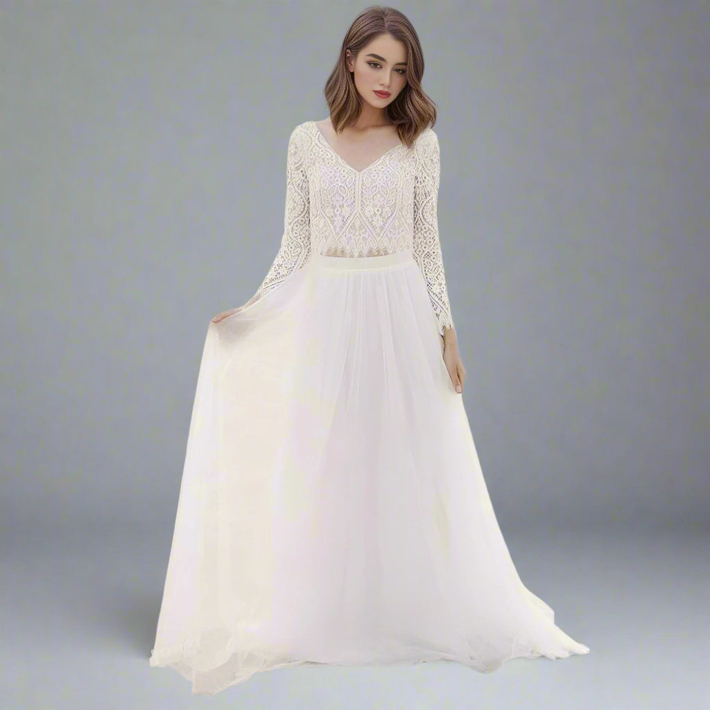 Bride wearing the Sylvia Two-Piece Wedding Dress, showcasing the lace top and flowing chiffon skirt.