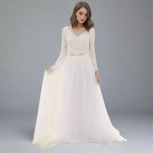 Bride wearing the Sylvia Two-Piece Wedding Dress, showcasing the lace top and flowing chiffon skirt.