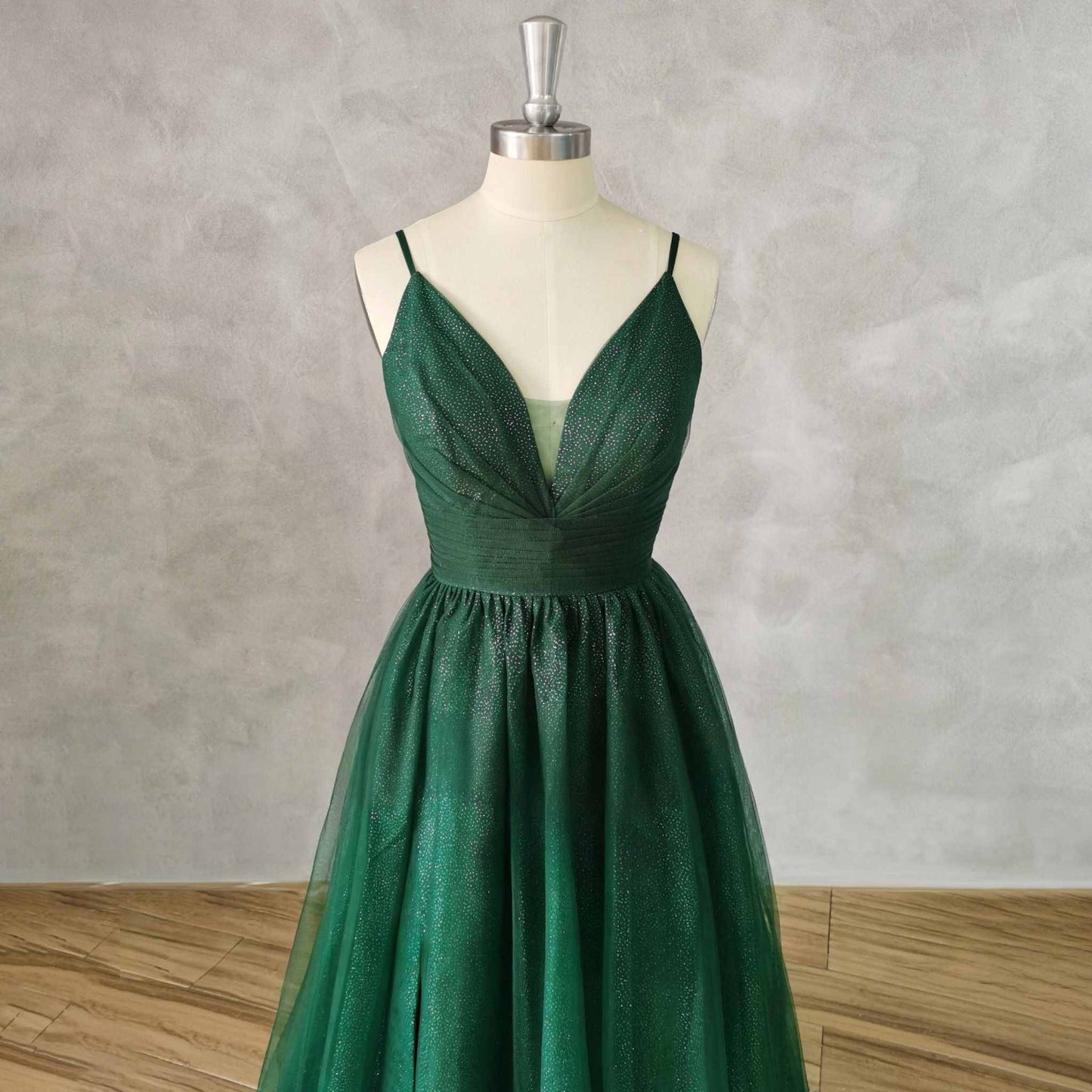 Close-up of the V-neckline and sleeveless design of the Tessa dress