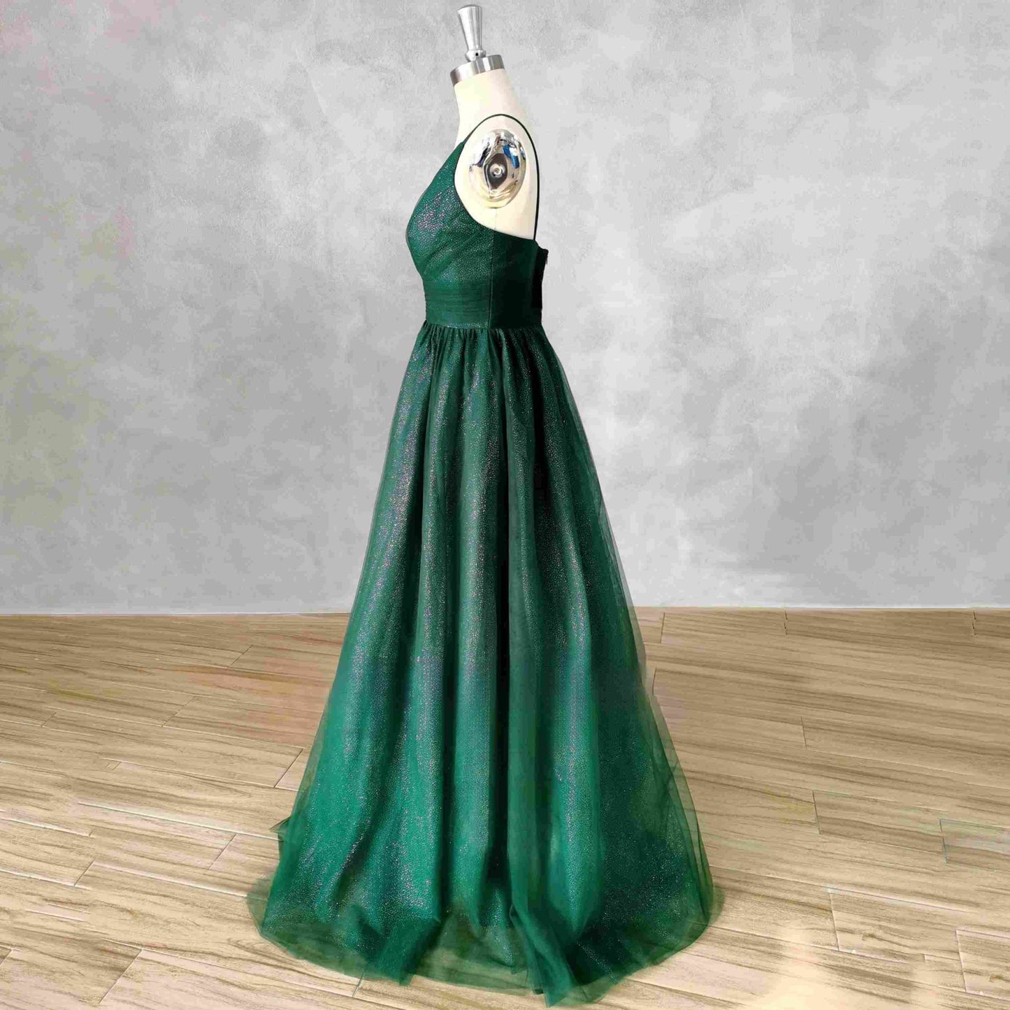 Side view of the Tessa Formal Couture Dress showing the A line silhouette