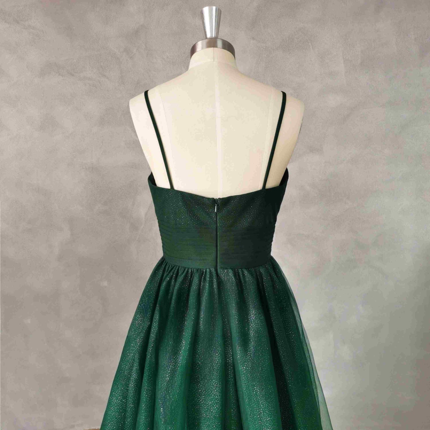 Backless view of the Tessa dress with a zipper closure and luxurious glitter tulle fabric