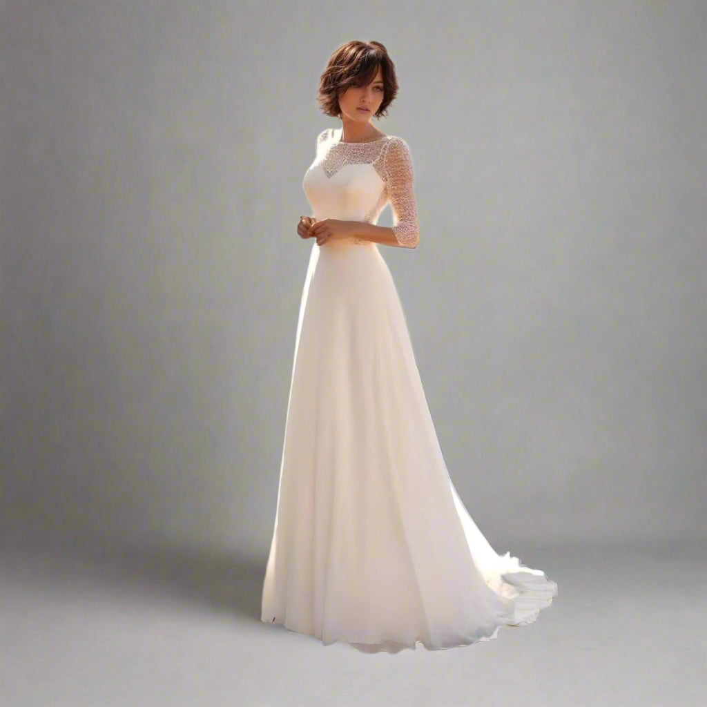 Elegant bride in Tori wedding gown with lace top and three-quarter sleeves
