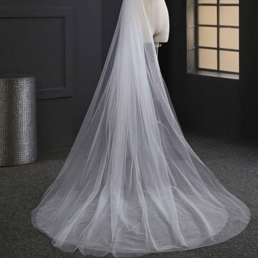 Bridal veil draping beautifully with cut edge design in ivory