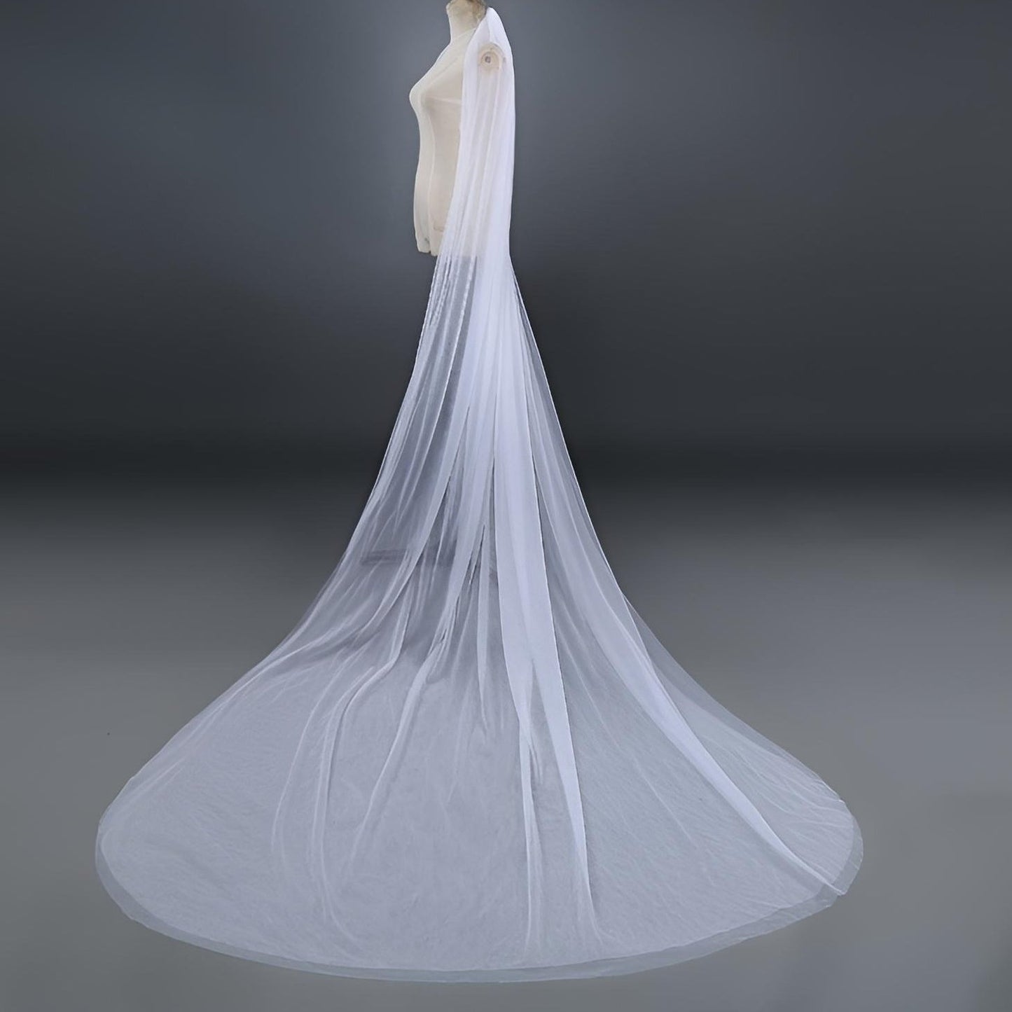 Timeless two-layer wedding veil in ivory on tailor mannequin