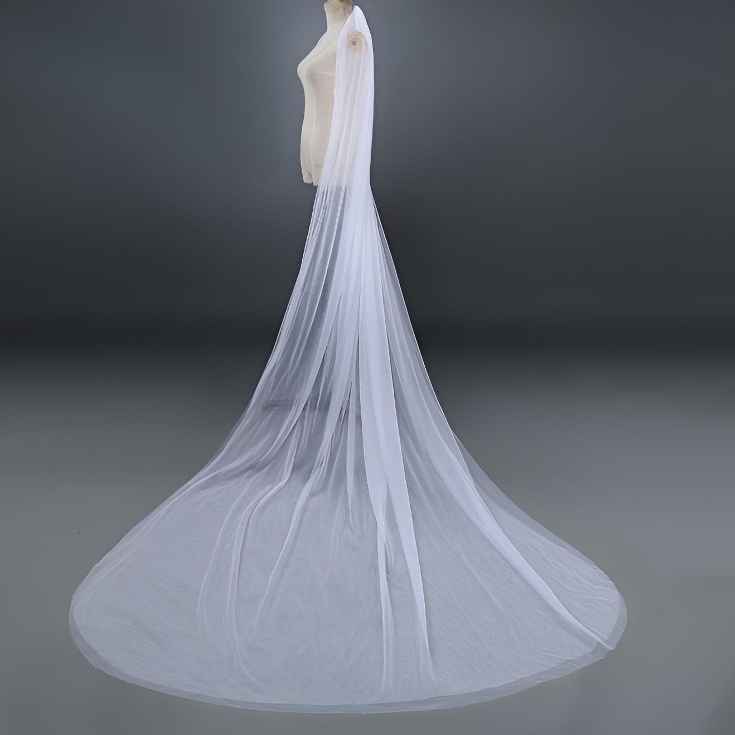 Timeless two-layer wedding veil in ivory on tailor mannequin