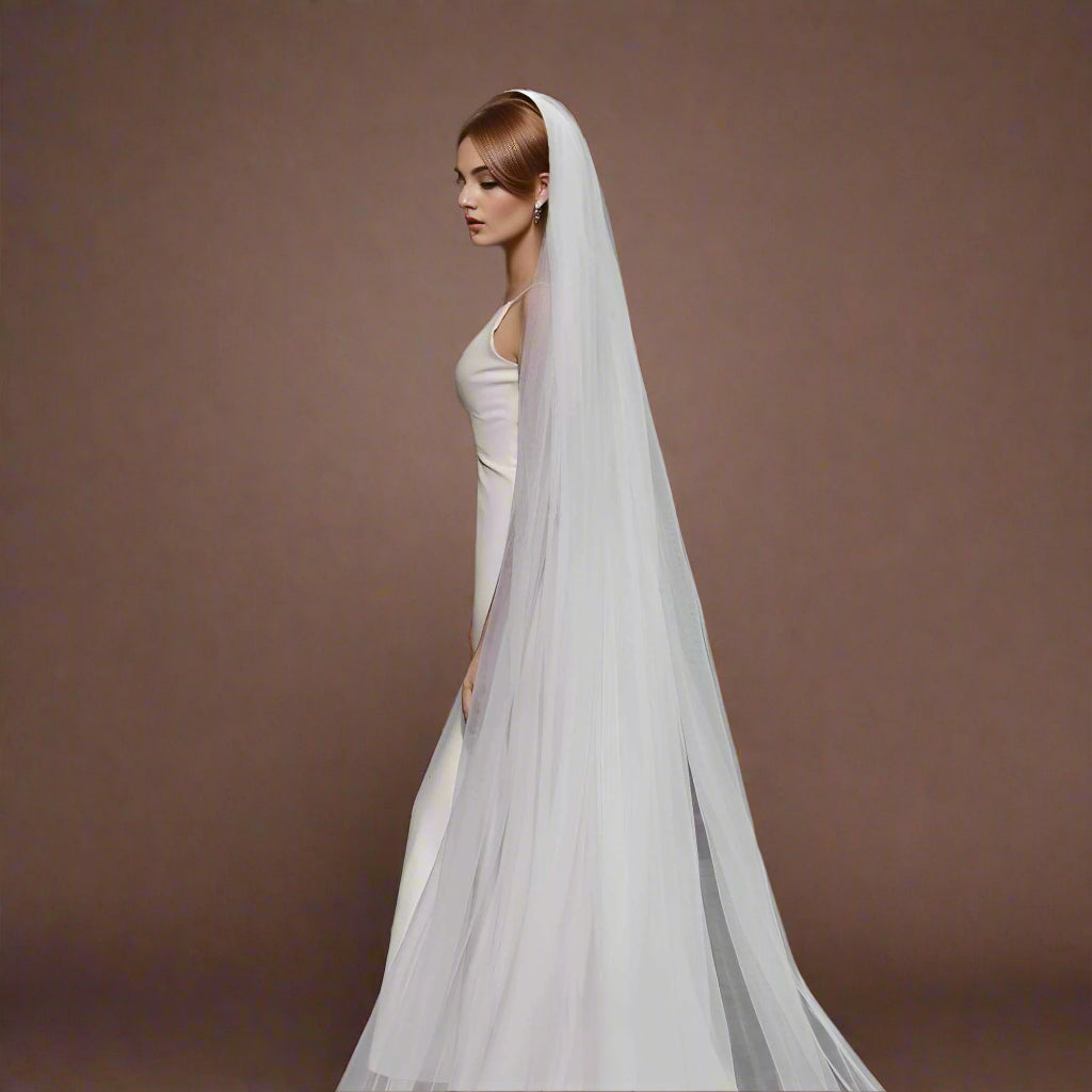 Bride wearing elegant bridal veil, ideal for adding romance to wedding day
