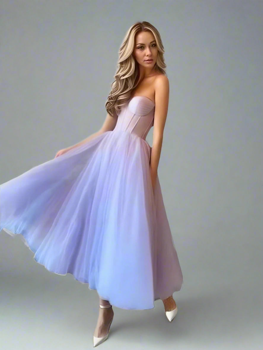 Woman twirling in light purple short A-line evening prom dress