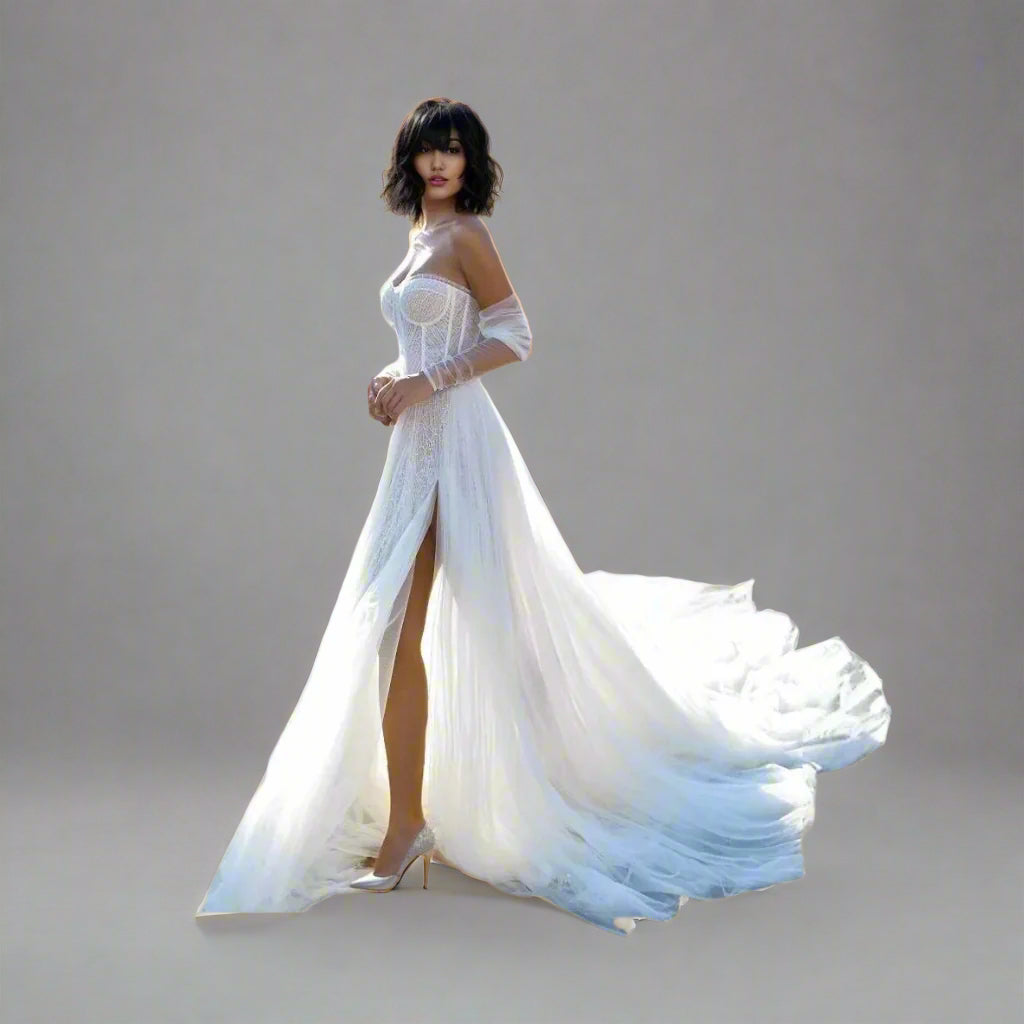 Bride posing in an A-line wedding gown with boho-inspired details showing long slit.