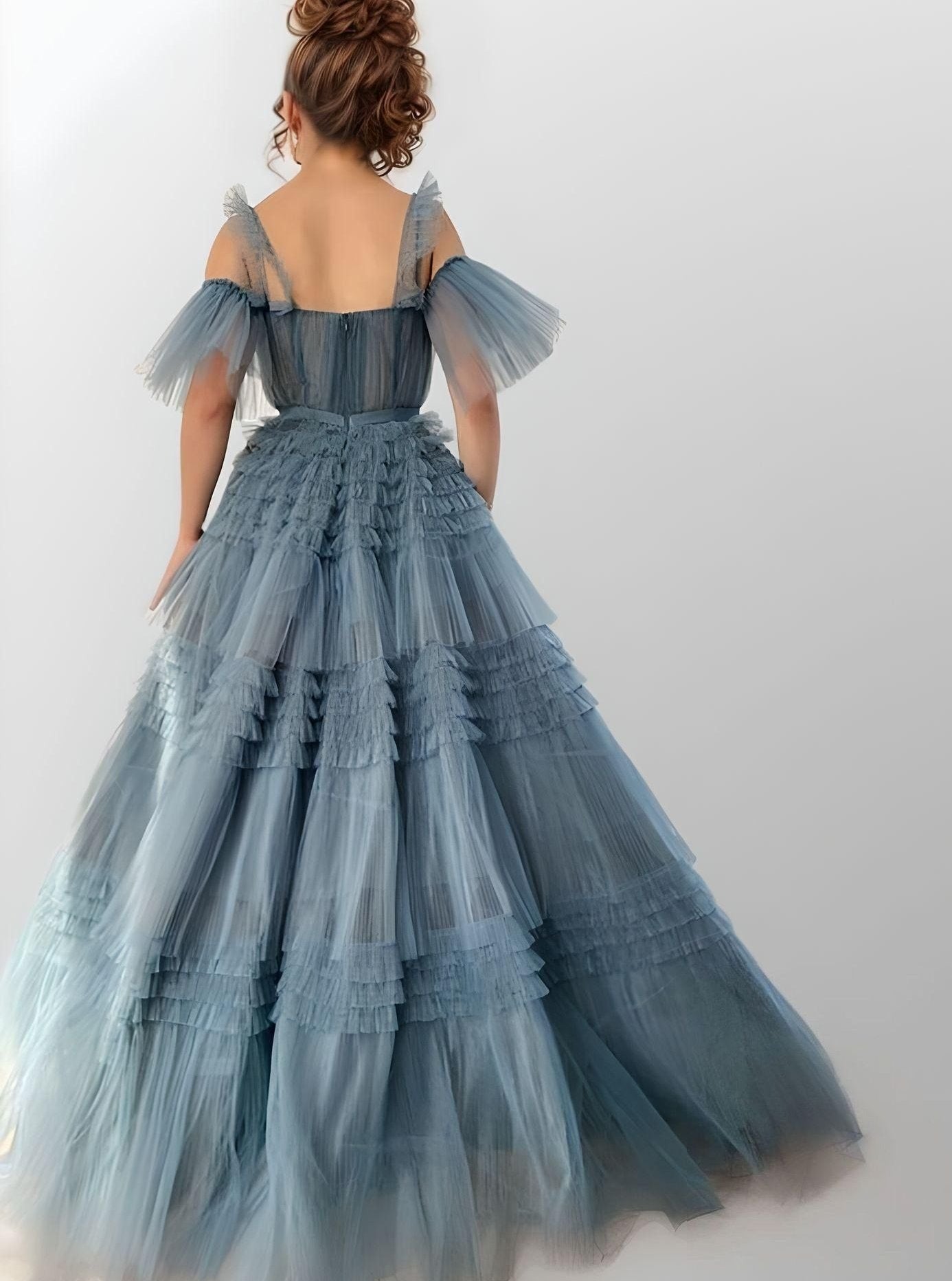 Back view of the Willow gown showcasing its sweep train.
