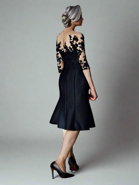 Back view of the Zelda dress showcasing its graceful drape on black satin and lace dress designed for wedding events.