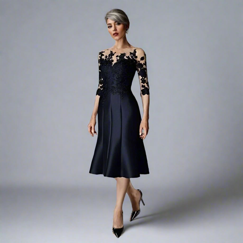 Elegant Zelda dress highlighting its elegant fit and sophisticated black evening gown for mothers of the bride.