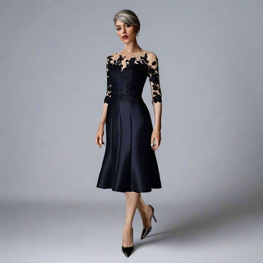 Elegant Zelda dress highlighting its elegant fit and sophisticated black evening gown for mothers of the bride.