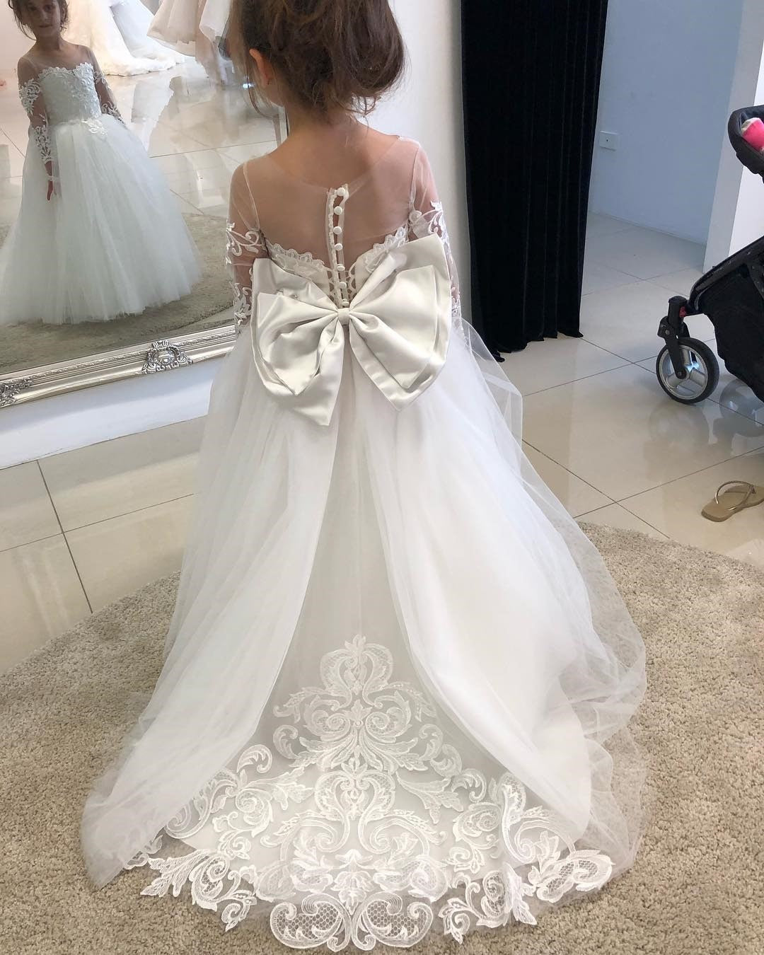 Girl twirling in MARA tulle skirt ball gown
