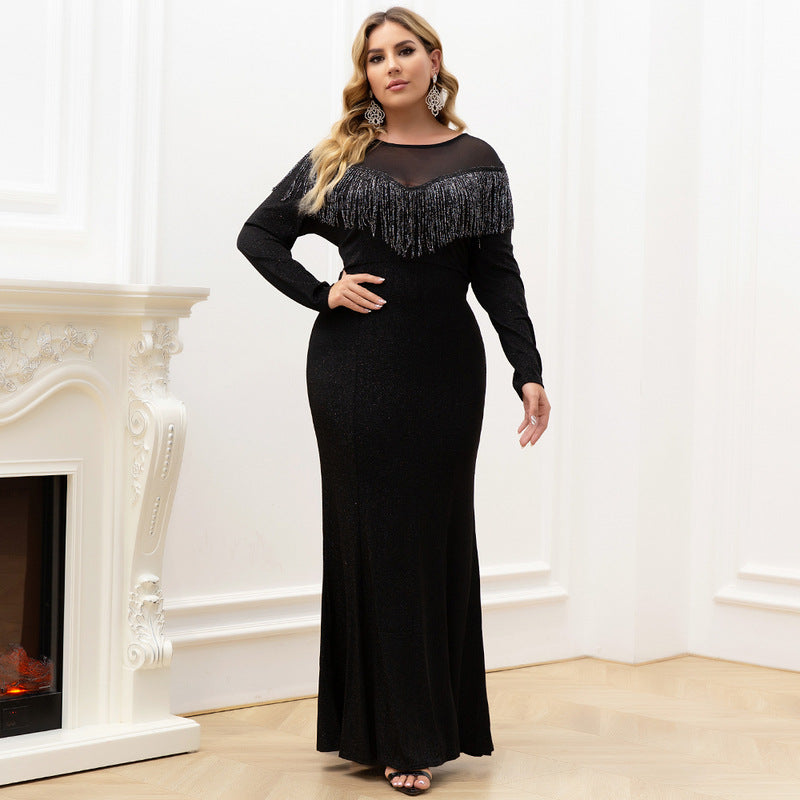 Woman wearing the Lyric Plus Formal Couture Dress showcasing the mermaid silhouette,