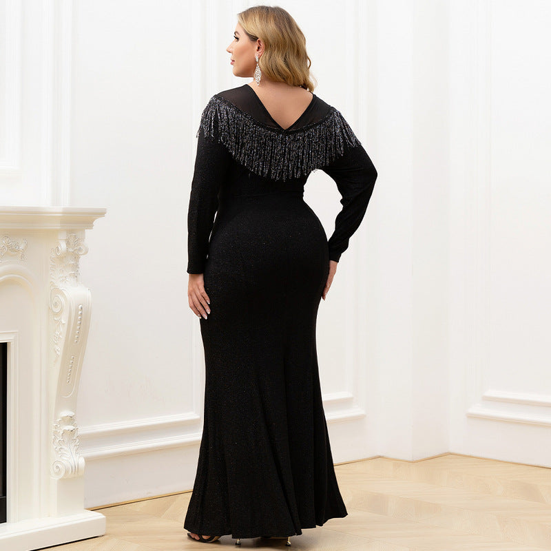 Back view of the Lyric Plus Formal Couture Dress showing the graceful trumpet/mermaid shape.