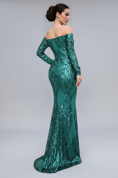 GEmerald green sequin off-shoulder evening gown on a plain background