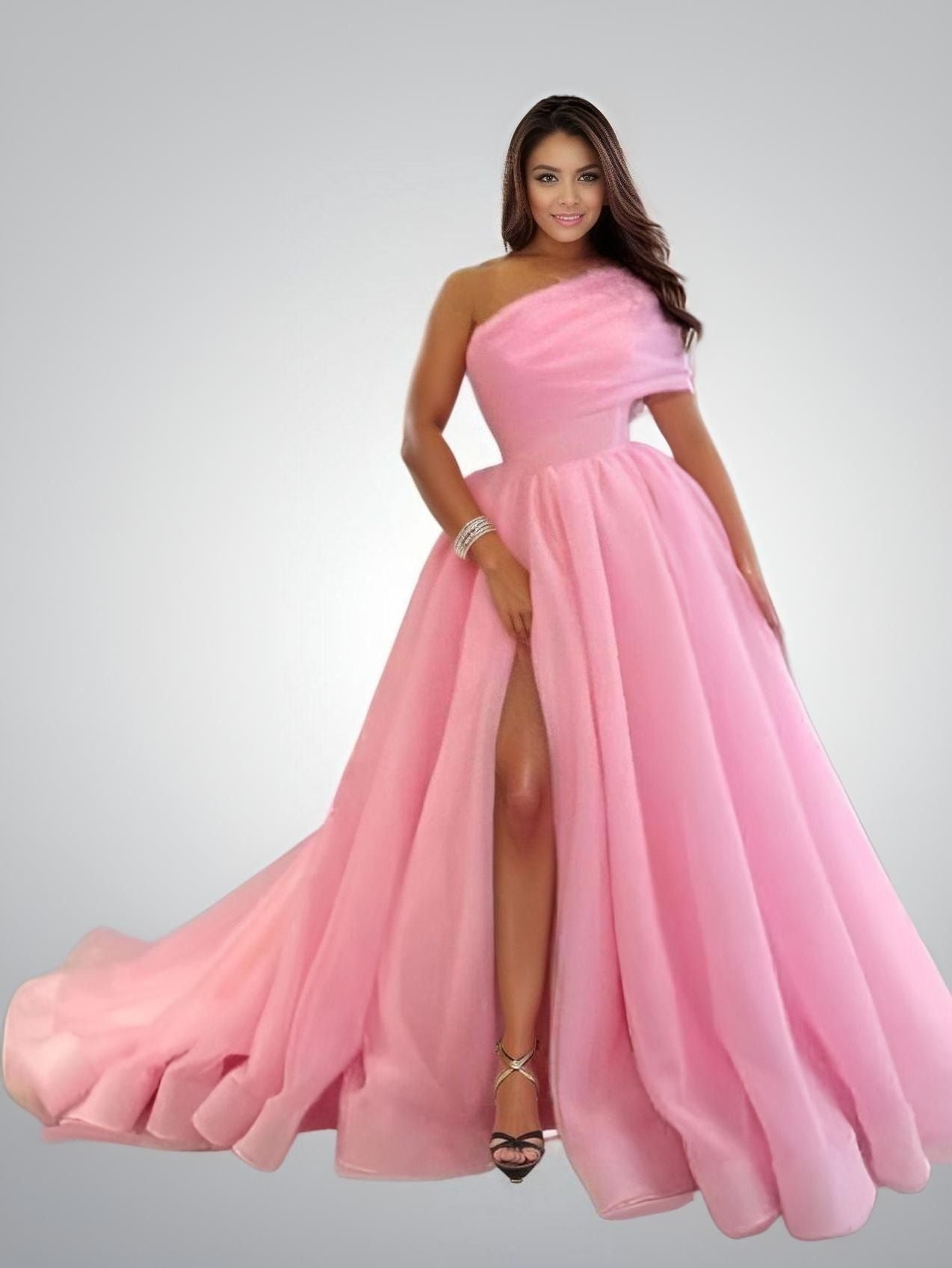 "Model showcasing Pink Alice one-shoulder organza gown"