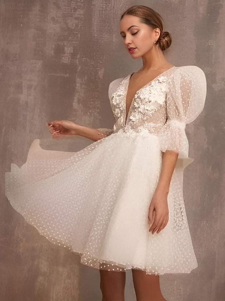 Bride in Chic Alora Bridal Gown Perfect for Intimate Elopements with Puff Sleeves 