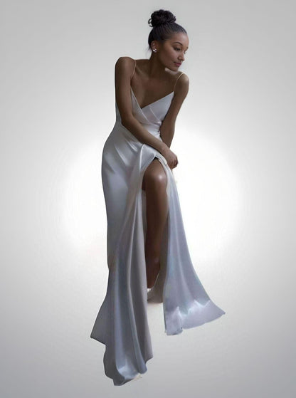 Bride model showcasing elegant V-neckline wedding gown with spaghetti straps