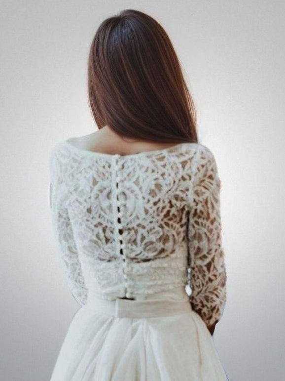 Wedding Dress top detail from back boasting a lace top with buttons and 3/4 lace sleeves