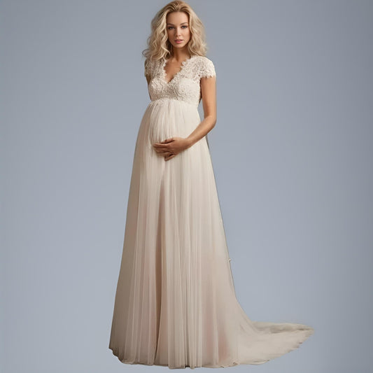 Pregnant Bride Wearing Beatrix Maternity Dress - Front View of Lace Top Maternity Bridal Gown