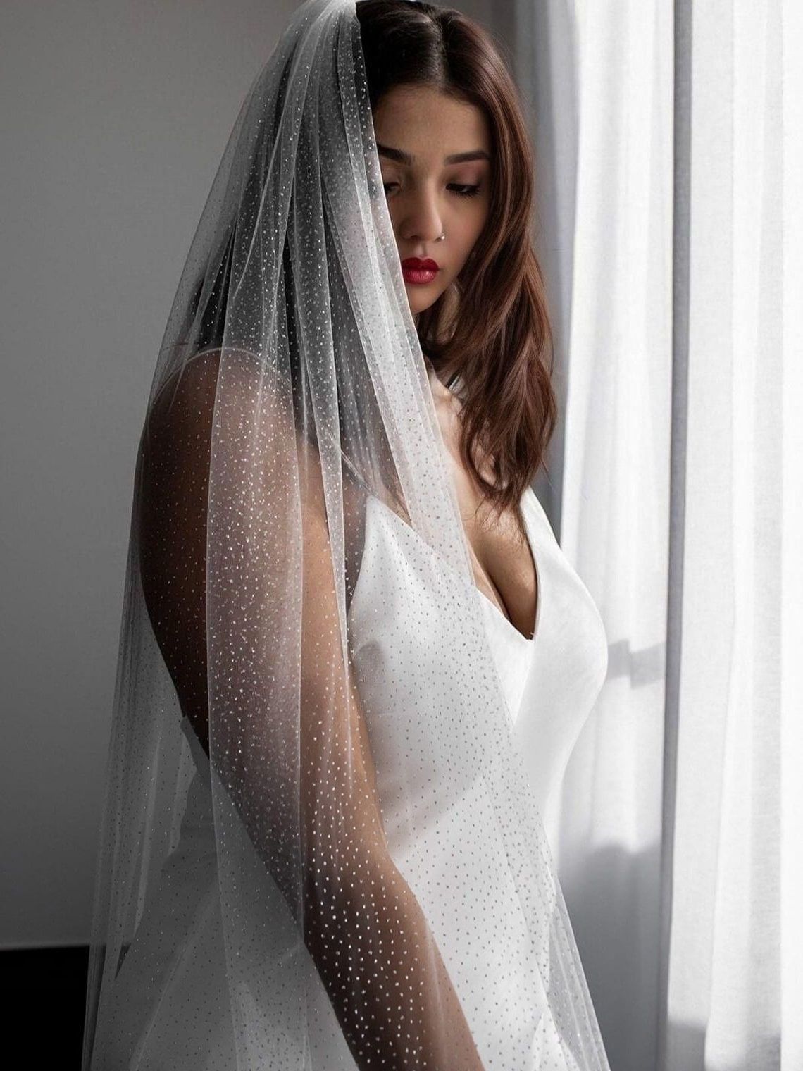 Bride with white ivory sparkling Wedding Veil in her from back- Bridal