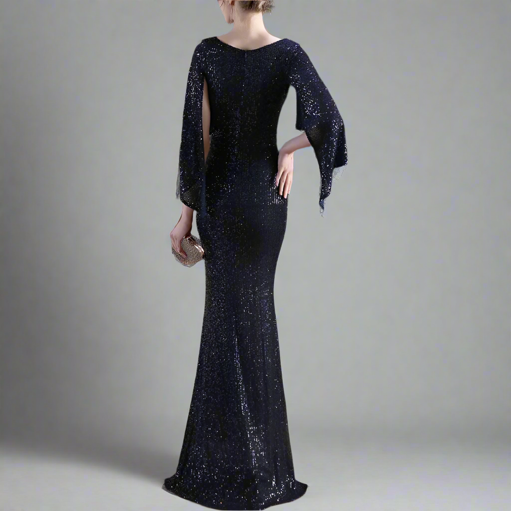 Navy blue sequin evening gown with cape on from back