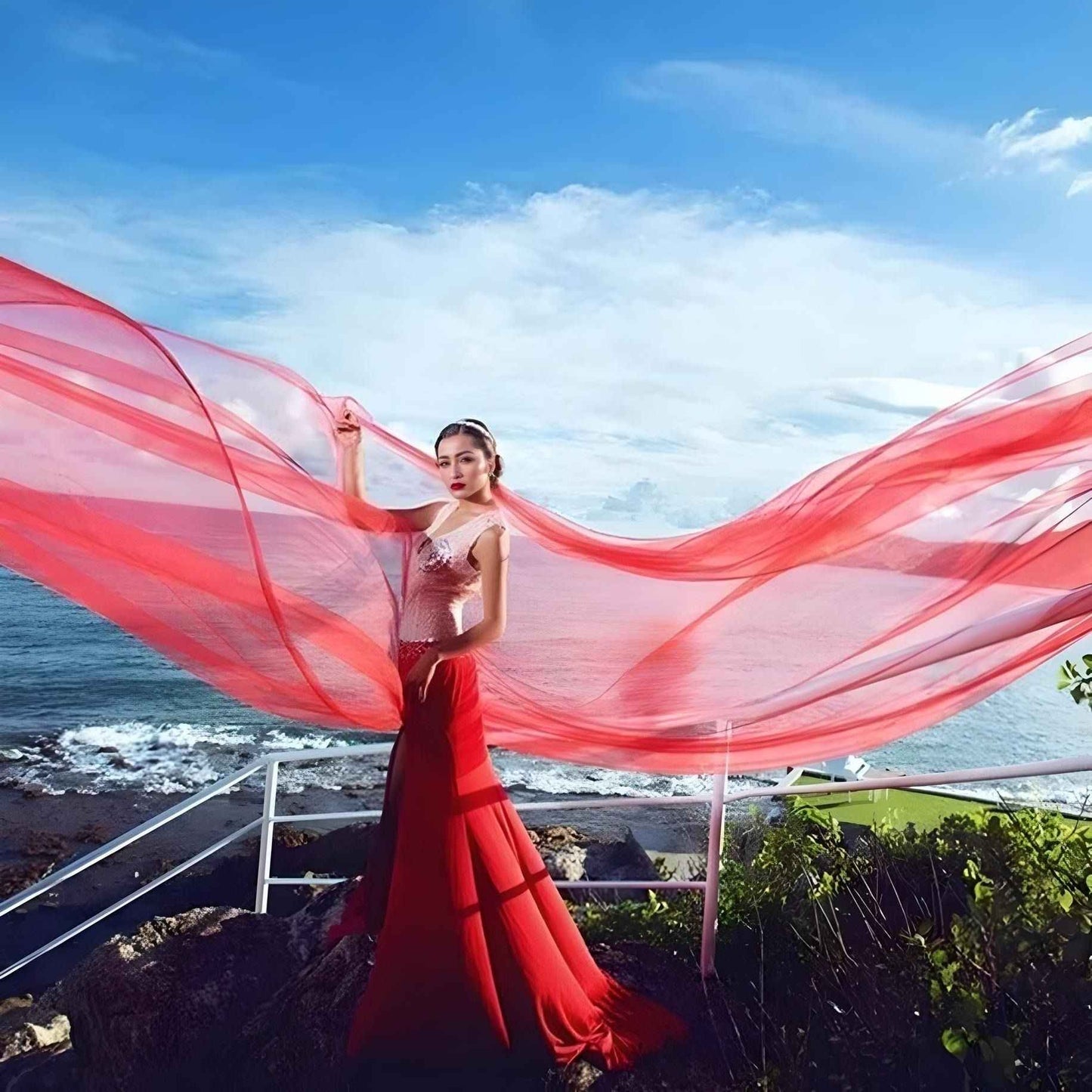 The veil in a bridal setup, showcasing how the red color contrasts beautifully with a white or ivory gown.
