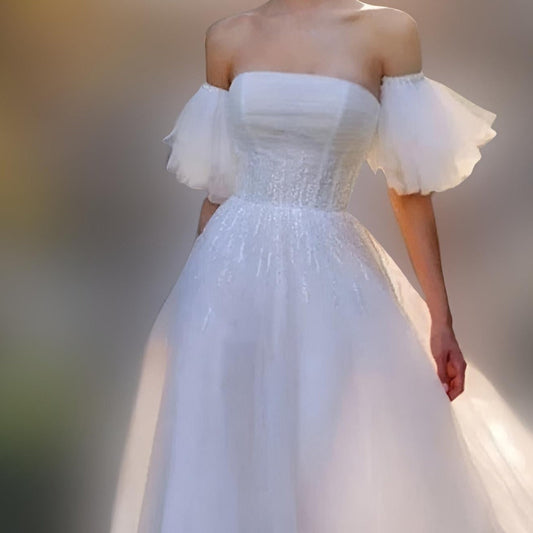 Close-up of removable bride sleeves with ruffle details