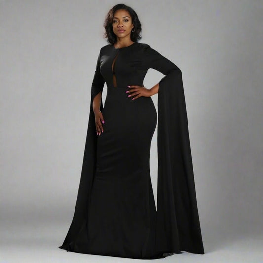 Full-length shot of the black Sonya Formal Dress, featuring the pleated skirt and sweep sleeves.